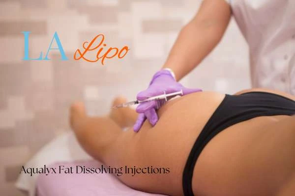 Woman having fat dissolving injections Burley on thighs